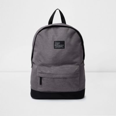 Grey zip pocket backpack